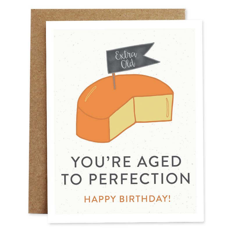 4 inch by 5 inch birthday card. Block of cheese. "You're aged to perfection." Blank on the inside. 